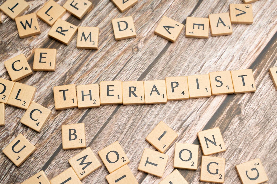 Tiles spelling out the word "therapist"